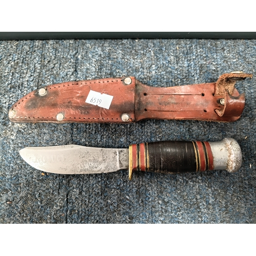 225 - A Sam brown belt with a magazine pouch, a West German commando knife, and 2 other knives in sheaths.