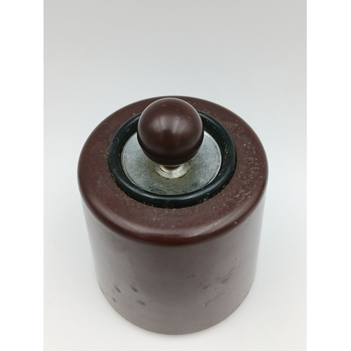 226 - A vintage DIL Flintless (Dorset industries ltd)  bakelite pull out table lighter. Height 12cm x 9.5c... 