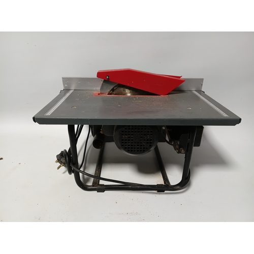 88 - A bench saw, pat tested and working. Height 10 inches x width 20 inches x depth 13 inches.
