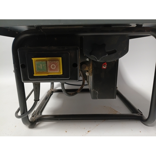 88 - A bench saw, pat tested and working. Height 10 inches x width 20 inches x depth 13 inches.