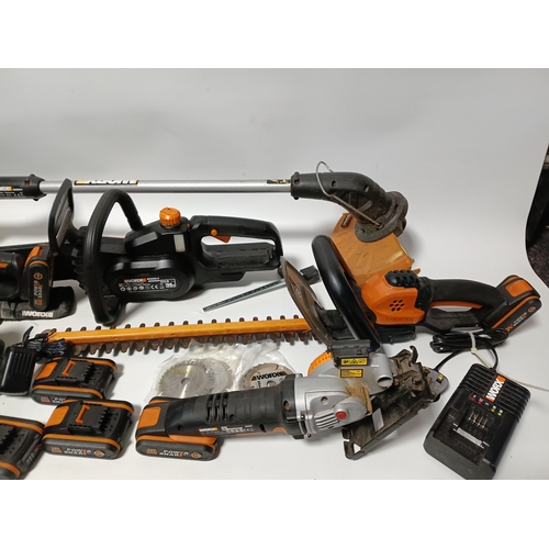 90 - A large collection Worx power tools to include a strimmer, hedge cutter, angle grinder, chainsaw, sa... 