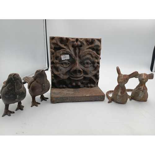 91 - A collection of small vintage cast iron garden ornaments to include, a pair of mice, a pair of birds... 