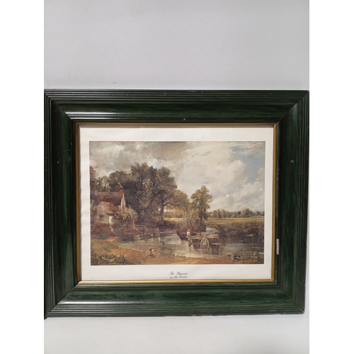 110 - A pair of prints in wooden frames, one titled 