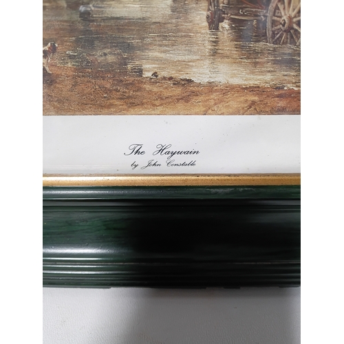110 - A pair of prints in wooden frames, one titled 