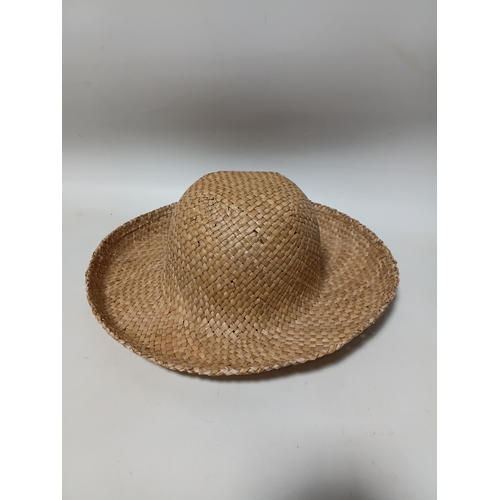 277 - A collection of 4 straw hats to include colours such as, white and brown.