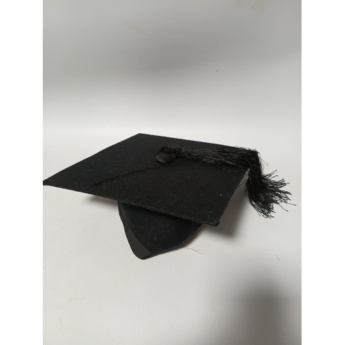 278 - An Ede & Ravenscroft graduation mortarboard hat and a tutor style saxe blue velvet hat.