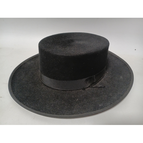 280 - A Sombreros Rusi felt hat and a black fabric eye mask.