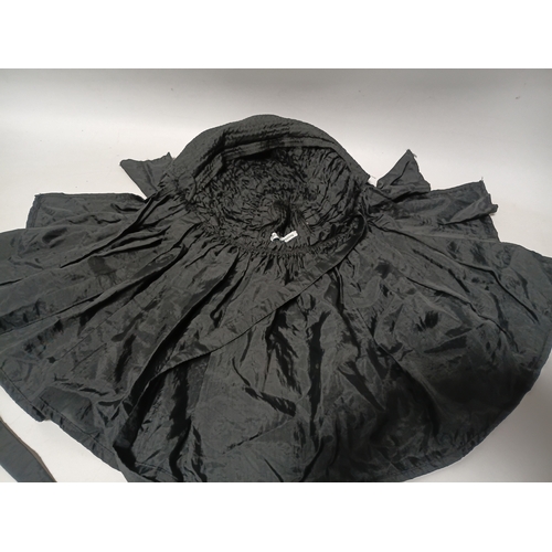 282 - A collection of 4 hats, to include, a white embroidered cap featuring a floral pattern,  a green fel... 