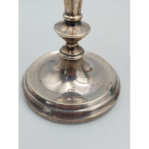 300 - A pair of Hallmarked Birmingham silver Candlesticks. Height 8.5 inches.  Total weight 585 grams.