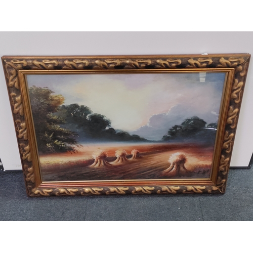 114 - A framed vintage oil painting under glass by artist 