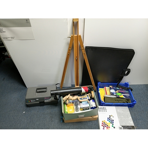 99 - A collection of artists equipment to include, a canvas 24 inches by 36 inches, 36 acrylic colour set... 