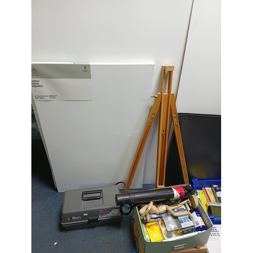 99 - A collection of artists equipment to include, a canvas 24 inches by 36 inches, 36 acrylic colour set... 