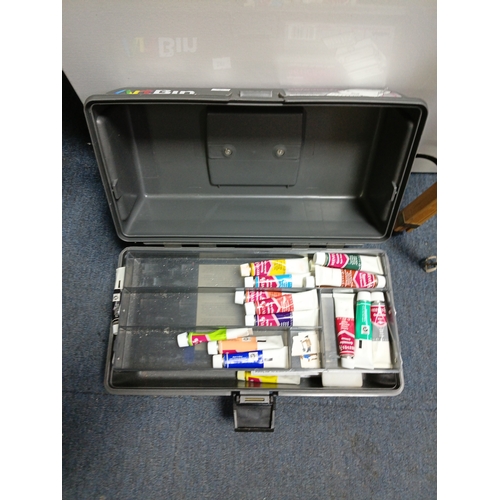 99 - A collection of artists equipment to include, a canvas 24 inches by 36 inches, 36 acrylic colour set... 