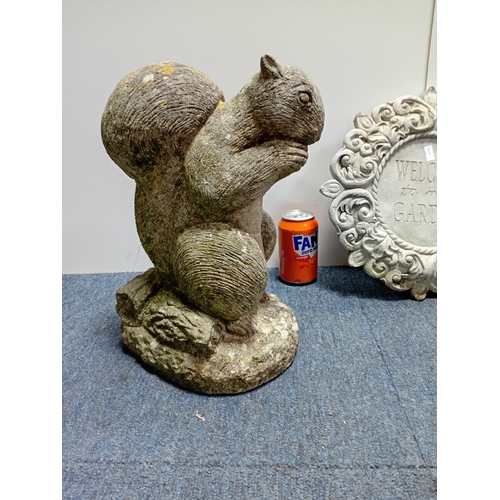 93 - Decorative concrete garden figures of a rooster and squirrel along with an ornamental plaque