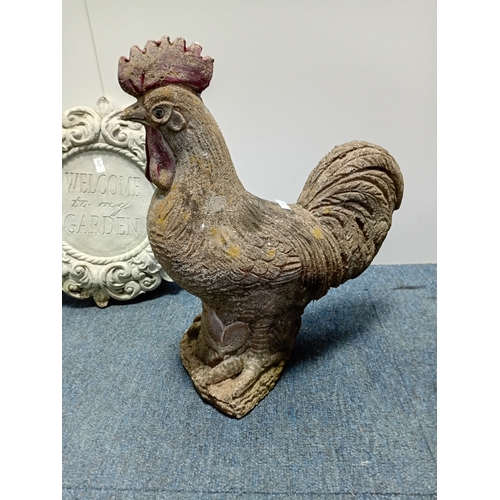 93 - Decorative concrete garden figures of a rooster and squirrel along with an ornamental plaque