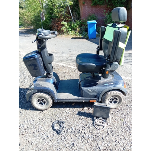 94 - An Invacare comet mobility scooter missing the key, with battery charger from a house clearance but ... 