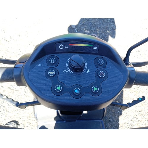 94 - An Invacare comet mobility scooter missing the key, with battery charger from a house clearance but ... 