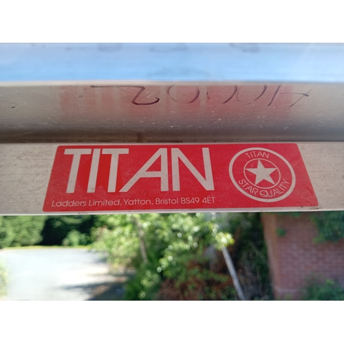 96 - A pair of Titan step / swing-back ladders. (Height 87 inches x total length 106 inches)