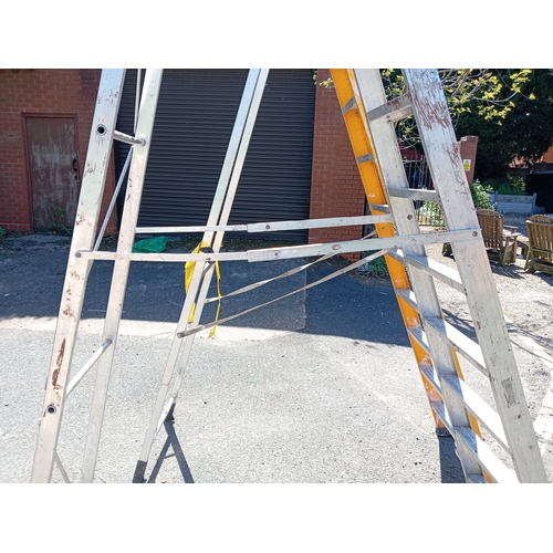 97 - A pair of step / swing-back ladders. (Height of platform 90 inches x total length 120 inches) & Heig... 
