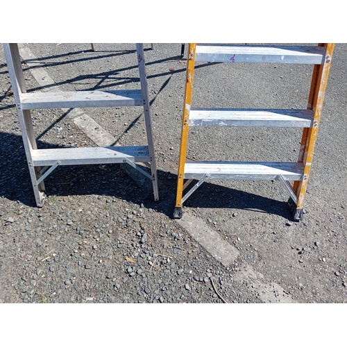 97 - A pair of step / swing-back ladders. (Height of platform 90 inches x total length 120 inches) & Heig... 