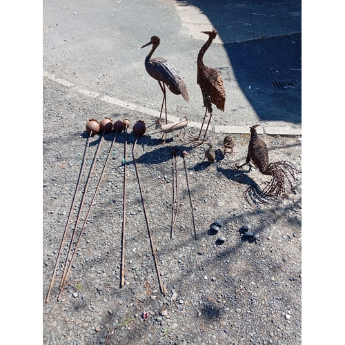 98 - A collection of rustic metal garden ornaments. To include various sized poppies (Largest Height 63 i... 