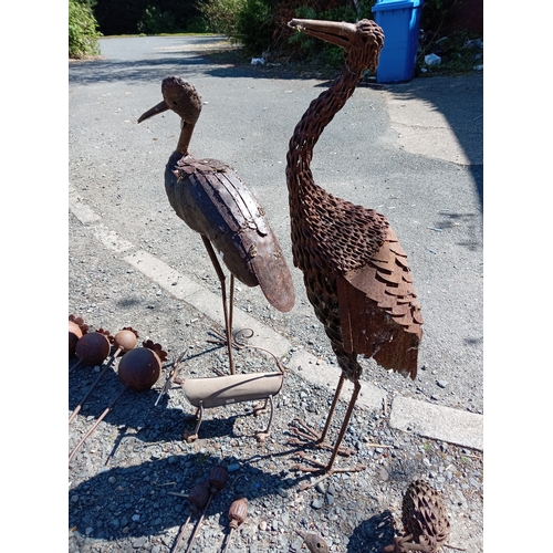 98 - A collection of rustic metal garden ornaments. To include various sized poppies (Largest Height 63 i... 