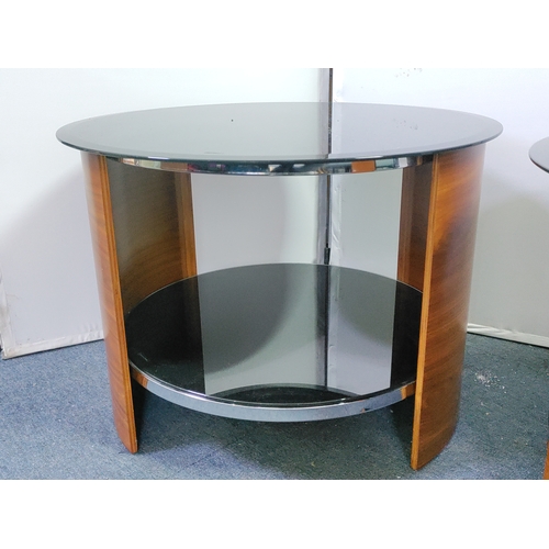 121 - A pair of mid-century teak bentwood side tables with chrome accents and glass top - Circular table m... 