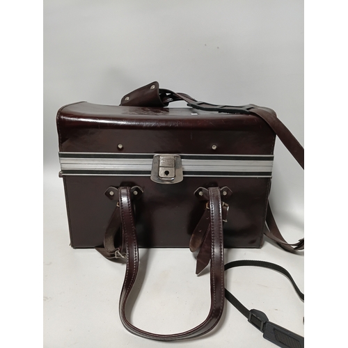 194 - A vintage Minolta X-700 film camera body, with a vintage manual focus zoom lens, specifically a Tou ... 