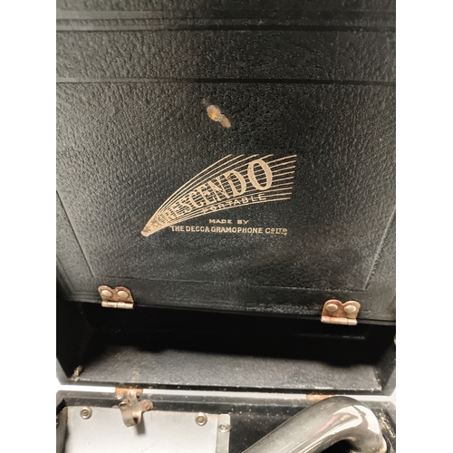 195 - A vintage Decca Crescendo portable wind-up box gramophone. Winds up and spins but needle head needs ... 