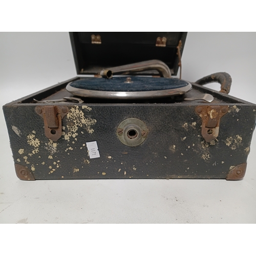 195 - A vintage Decca Crescendo portable wind-up box gramophone. Winds up and spins but needle head needs ... 