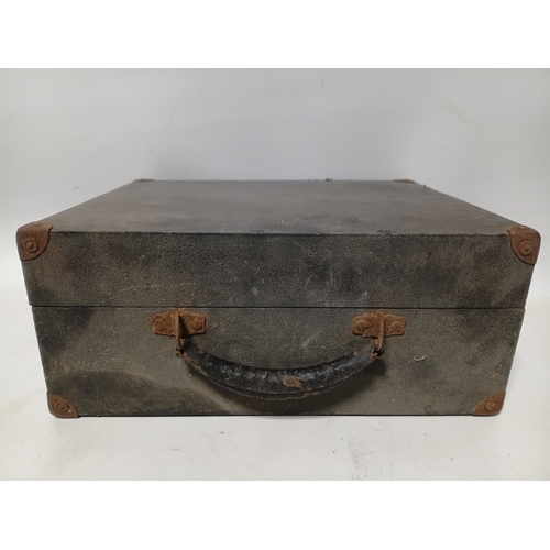 195 - A vintage Decca Crescendo portable wind-up box gramophone. Winds up and spins but needle head needs ... 