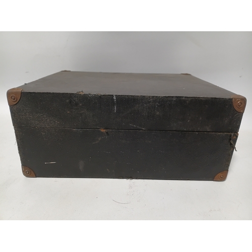 195 - A vintage Decca Crescendo portable wind-up box gramophone. Winds up and spins but needle head needs ... 