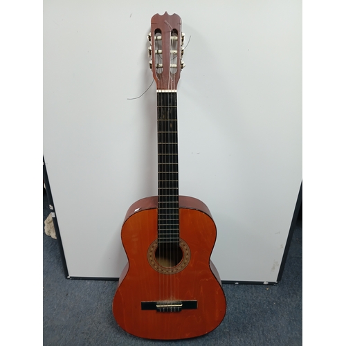 197 - A pair of guitars to include a Zennox electric guitar untested with a stand and an unbranded acousti... 