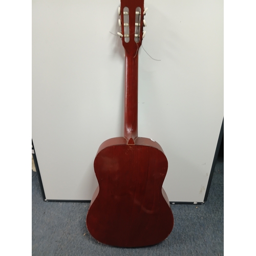 197 - A pair of guitars to include a Zennox electric guitar untested with a stand and an unbranded acousti... 