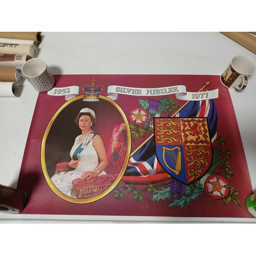 229 - A collection of maps and posters, to include, tribute to the queen mother poster, a map of Worcester... 