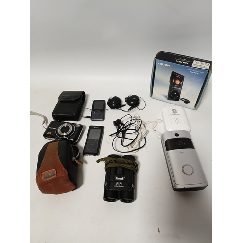 230 - A collection of items to include, door bells, mp3 players, headphones, a Fujifilm camera, 2 camera b... 