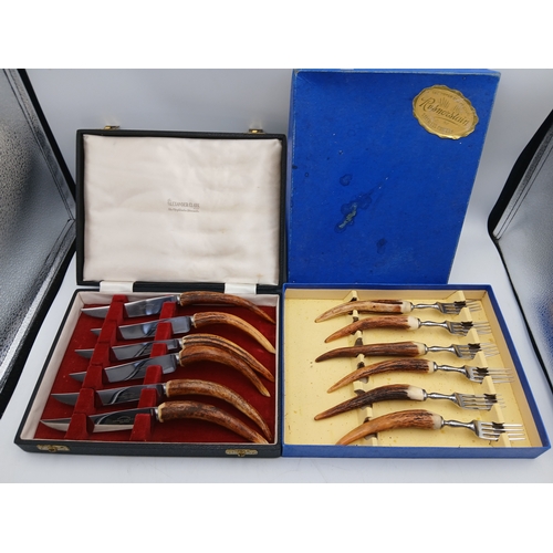 232 - Two sets of boxed antler handled cutlery. To inlcude Alaxander clark knives