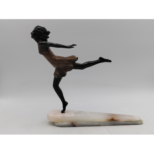 284 - A bronze Art-Deco figurine on an onyx base - Height 28cm