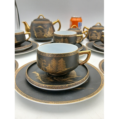 286 - A vintage hand painted 22k gold japanese tea set. To inlcude, teapot, sugar bowl, milk jug, six cups... 