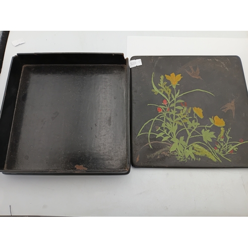 287 - A vintage Japanese lacquered paper mache storage box with hand painted floral design, Height 1.5 inc... 