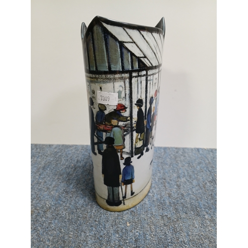 288 - A Beswick Silhouette d'art L S Lowry ceramic vase with printed copy of market scene to the sides. He... 