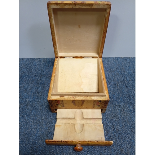 293 - A marquetry cigarette dispenser box and a Callard and Browser tin. The largest item measures height ... 