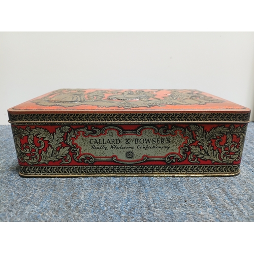 293 - A marquetry cigarette dispenser box and a Callard and Browser tin. The largest item measures height ... 