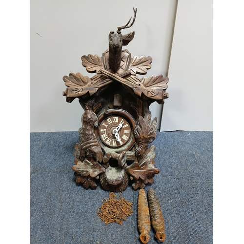 233 - A German Black Forest wooden hunter style mechanical cuckoo clock. Untested, height 17 inches x widt... 