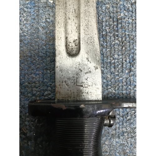 234 - An American 1943 wwii M1 Garand Bayonet with an equipment belt and sheath.