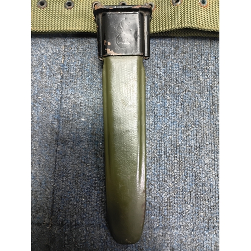 234 - An American 1943 wwii M1 Garand Bayonet with an equipment belt and sheath.