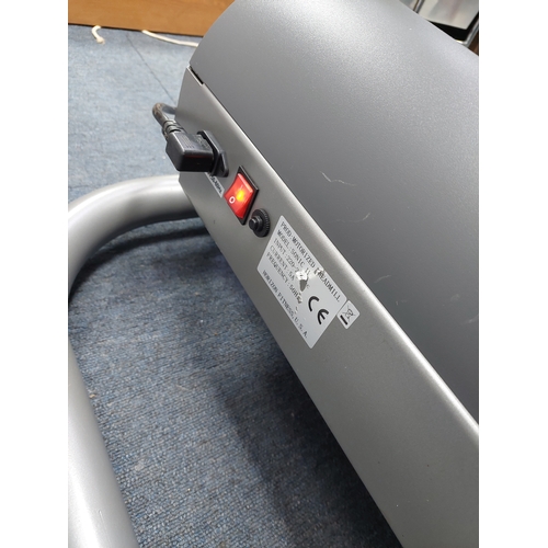 119 - A Horizon fitness treadmill. Folds away. Pat tested and working.