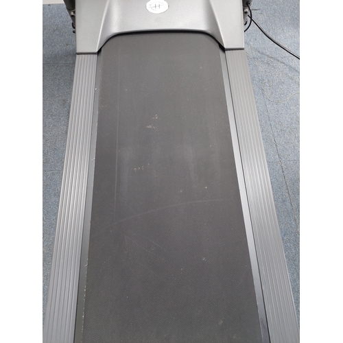 119 - A Horizon fitness treadmill. Folds away. Pat tested and working.