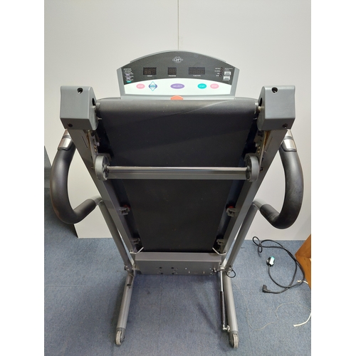119 - A Horizon fitness treadmill. Folds away. Pat tested and working.