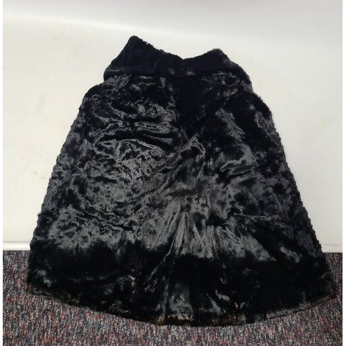 238 - A vintage 1950's John Orton Furrier ladies black fur cape. 53cm drop from button to bottom edge.